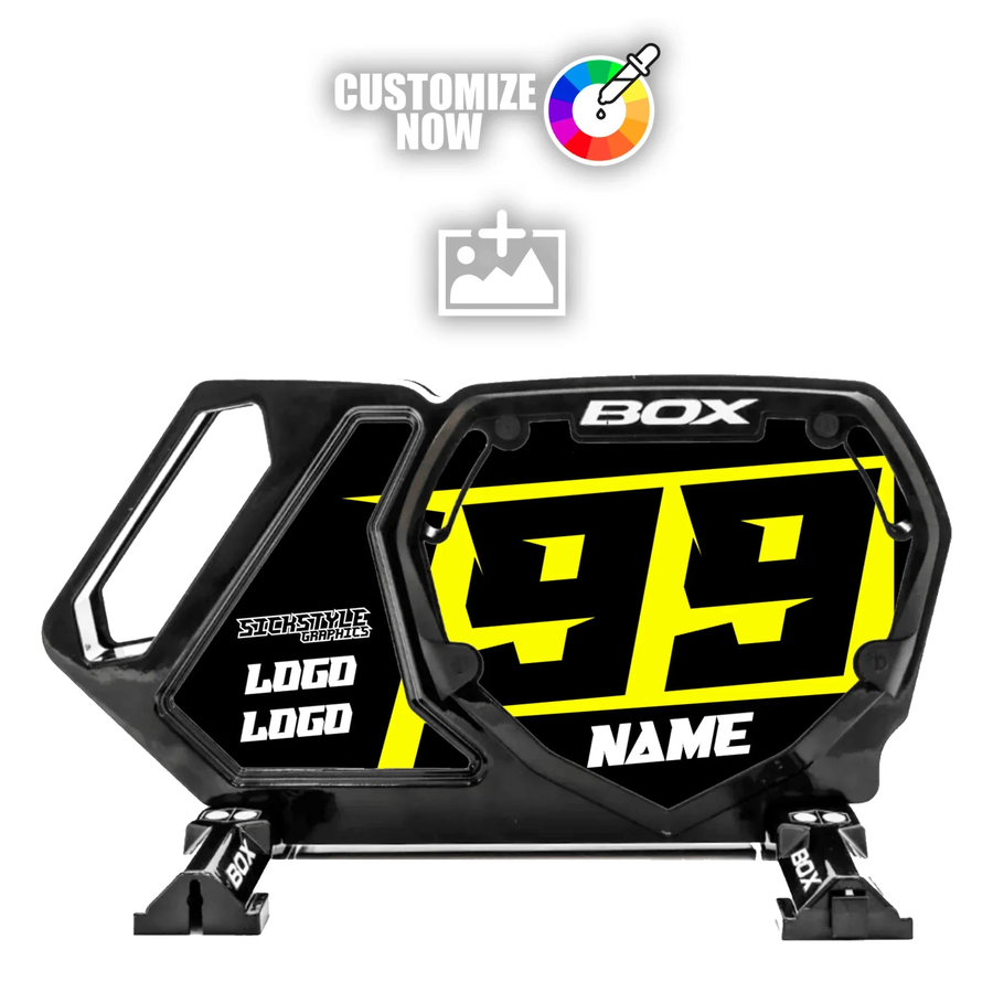 Black BOX cykel står med anpassningsbar gul-svart klistermärke “99 NAME” Stickstyle Graphics LOGO.
