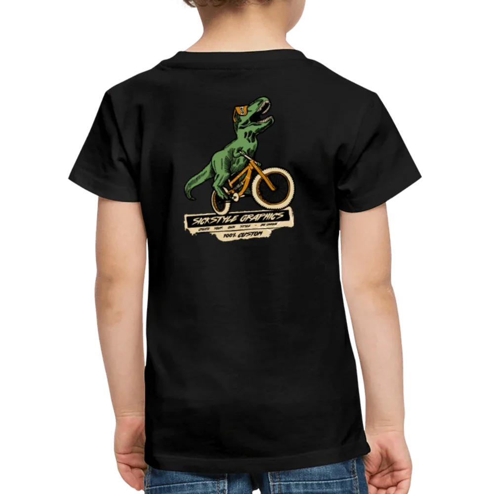 T-shirt nero per bambini con T-Rex verde su bicicletta arancione e stampa “Sickstyle Graphics”.